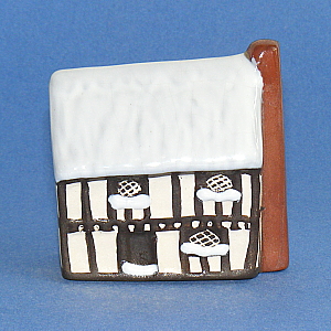 Image of Mudlen End Studio model No 2 Cottage with snow